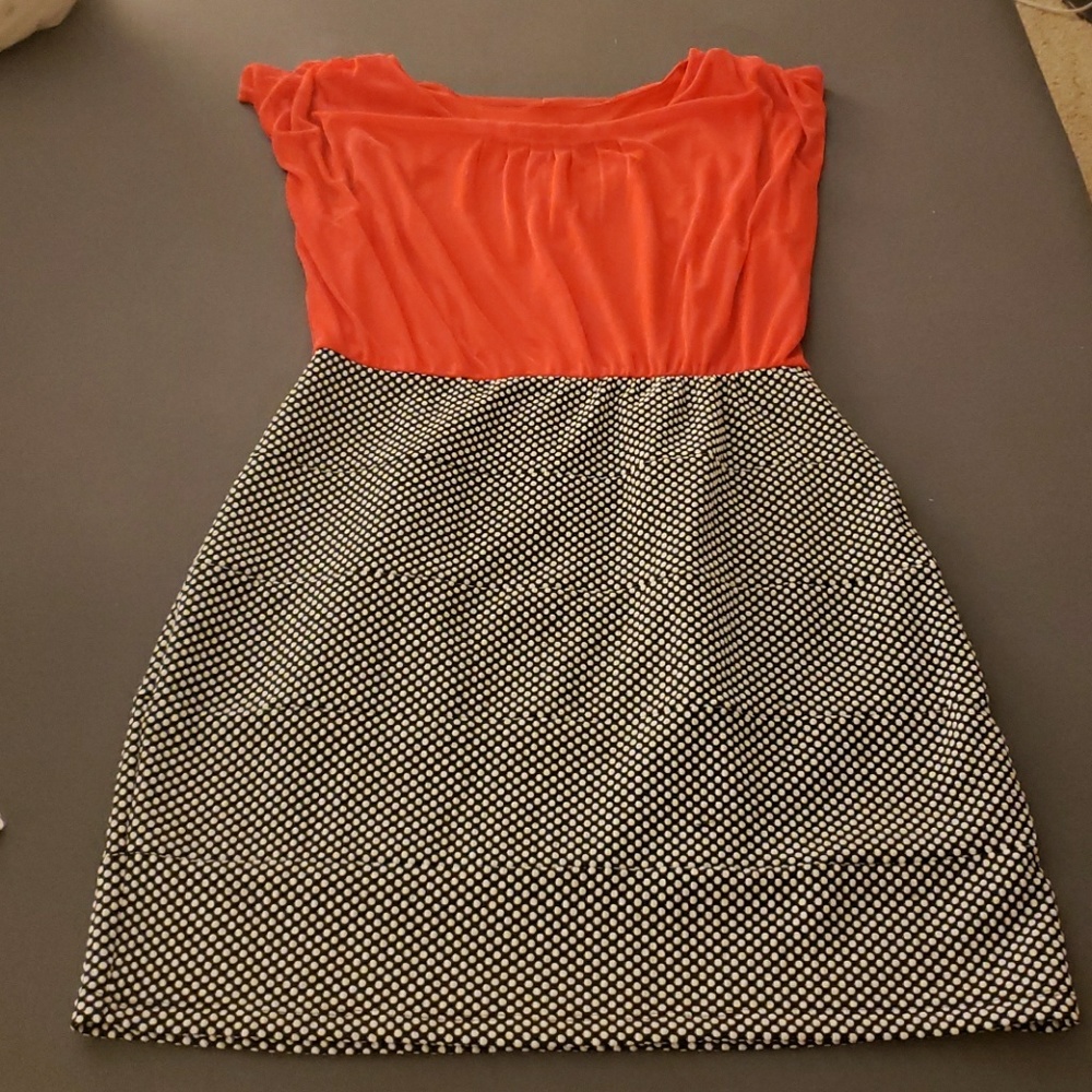 Orange, black and white dress